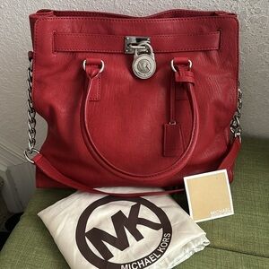 Authentic Michael Kors red bag with silver hardware